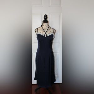Midnight Decision Satin Dress
Color: Navy
Size: M
from Commense